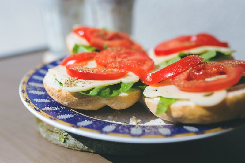 Roasted vegetable sandwich with hummus on multigrain bread
