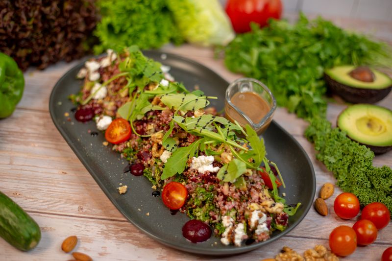 Salmon and quinoa power bowl with edamame and sesame dressing